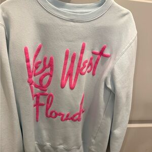 Light Blue Crew Neck Sweater with Pink Design